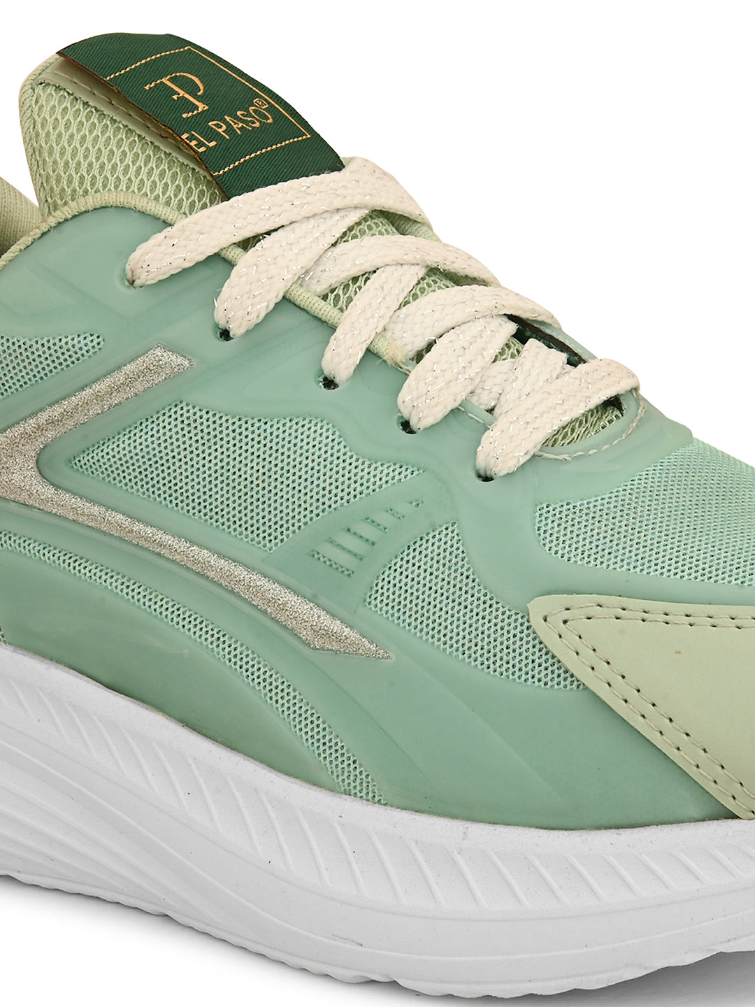 A green and white sneaker with a simple design.