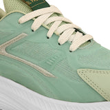 A green and white sneaker with a simple design.