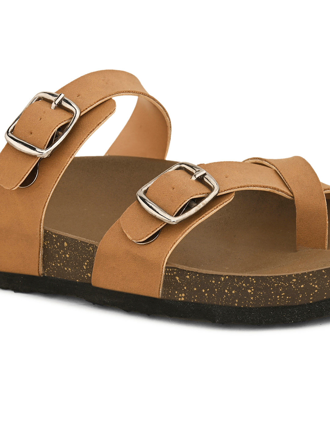 Brown cork-sole sandal with two adjustable straps featuring silver buckles and a casual slip-on design.