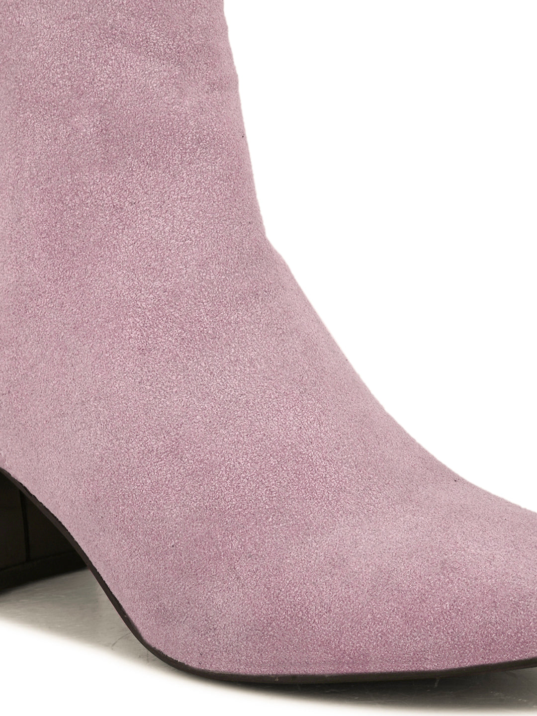 Light pink suede ankle boots with a sleek design and block heel.