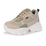 Beige and green chunky sneaker with a textured sole and modern design