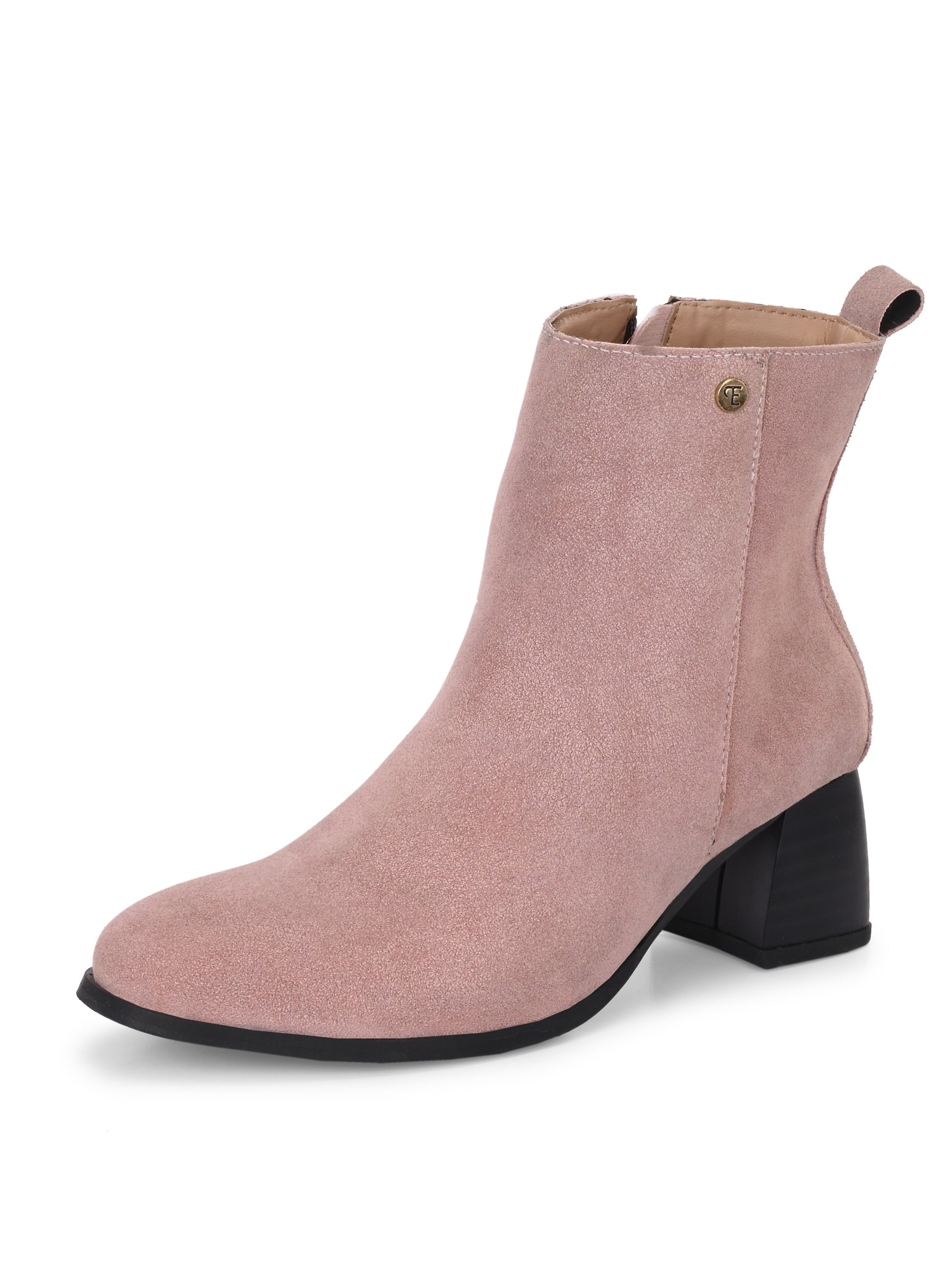 Light pink heigh top boot with a block heel and a sleek, minimalist design.
