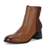 women black zip ankle length boots with a smooth leather front, suede back, block heel, pointed toe