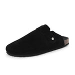 Black suede slip-on clog with a black rubber sole and adjustable strap.