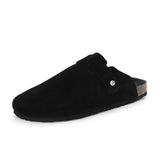 Black suede slip-on clog with a black rubber sole and adjustable strap.
