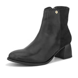 Black ankle boot with a smooth leather front, suede back, block heel, pointed toe with a zip