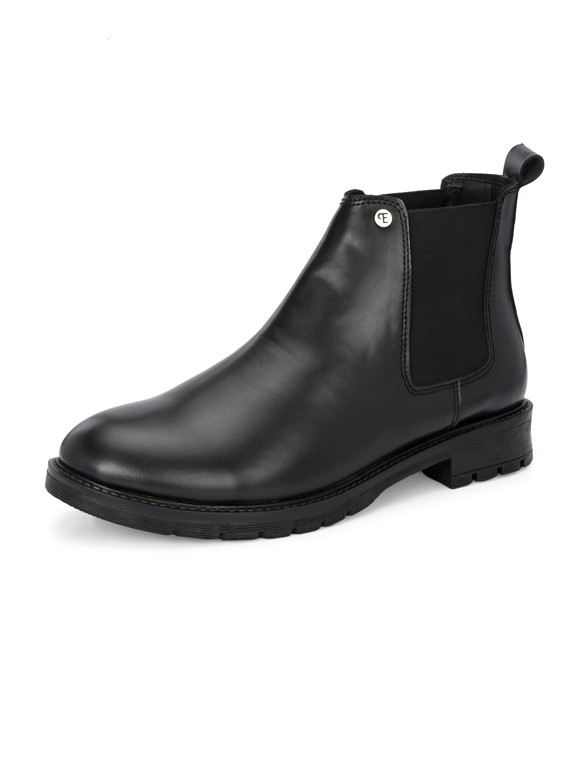 Classic Chelsea boots with elastic side panels, a pull-tab at the heel, rounded toe, and a small metallic brand logo near the ankle.