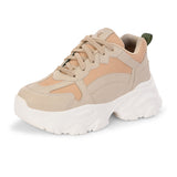 Beige chunky sneakers with a textured sole and mesh accents.