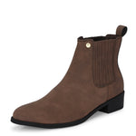 Brown suede slip-on boots with ribbed elastic panels, a pull-tab, and a low block heel for a stylish, comfortable fit.