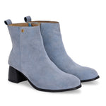 Light blue Suede ankle boots for women with a block heel and a sleek, minimalist design.