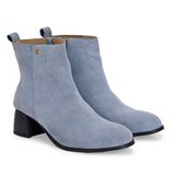 Light blue Suede ankle boots for women with a block heel and a sleek, minimalist design.