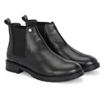Black leather Classic Chelsea boot with elastic side panels, pull-tab at the heel, rounded toe, and a small metallic brand logo near the ankle.