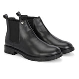 Black leather Classic Chelsea boot with elastic side panels, pull-tab at the heel, rounded toe, and a small metallic brand logo near the ankle.