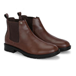 Black leather Classic Chelsea boot with elastic side panels, pull-tab at the heel, rounded toe, and a small metallic brand logo near the ankle.