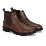 Black leather Classic Chelsea boot with elastic side panels, pull-tab at the heel, rounded toe, and a small metallic brand logo near the ankle.