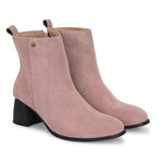 Light pink Suede ankle boots for women with a block heel and a sleek, minimalist design.