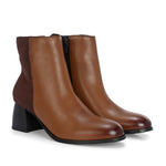 women brown zip ankle length boots with a smooth leather front, suede back, block heel, pointed toe