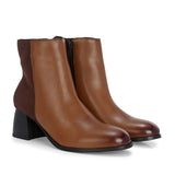 women brown zip ankle length boots with a smooth leather front, suede back, block heel, pointed toe