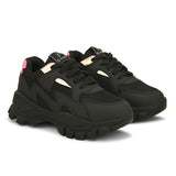 A pair of black El Paso lace-up women's sneakers with chunky soles, mesh detailing, and subtle pink and white accents.