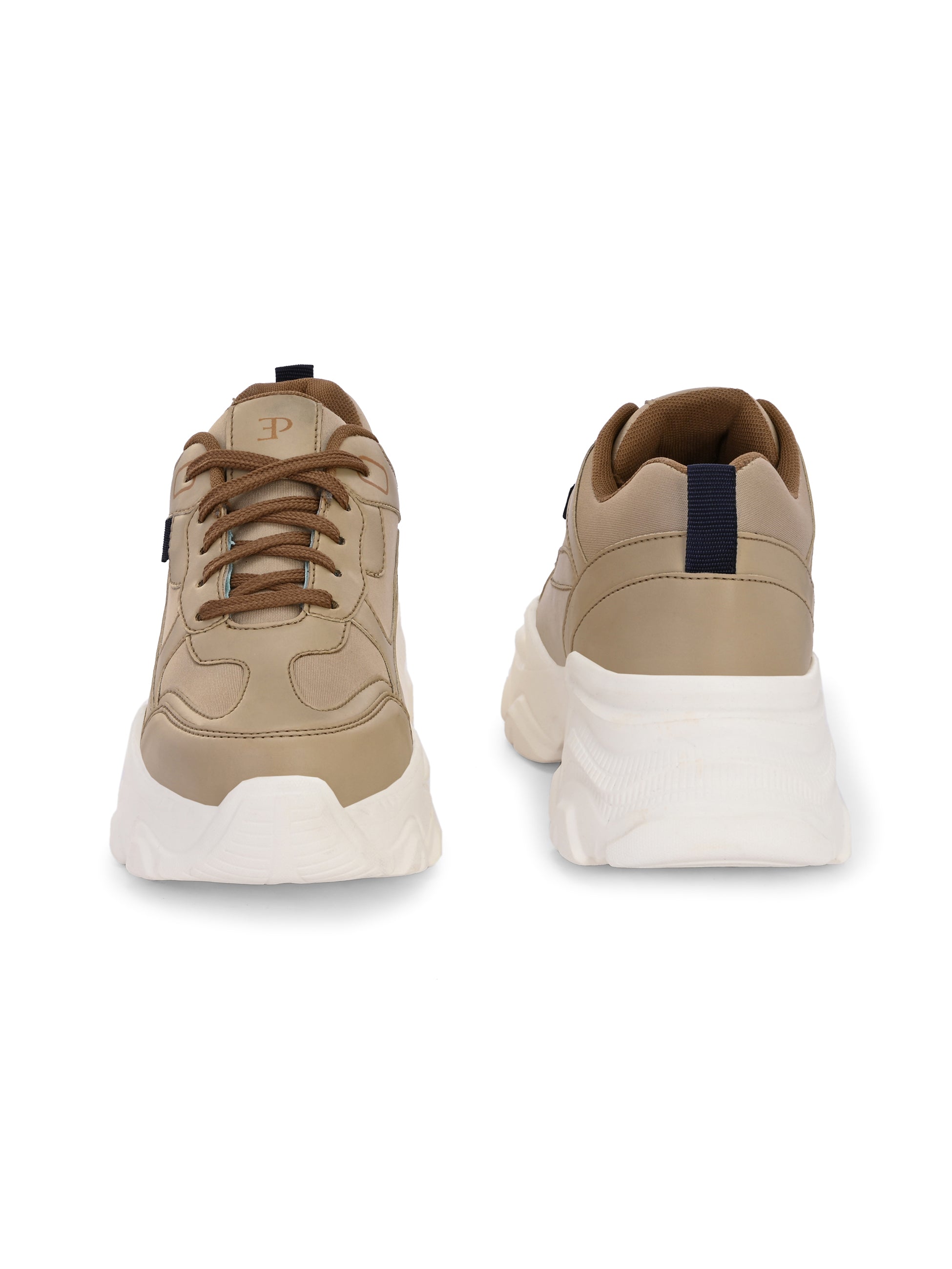 Beige sneaker with a textured white sole, brown laces, and modern detailing, designed for casual and stylish wear.