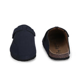 Blue suede slip-on clog with a black rubber sole and adjustable strap.
