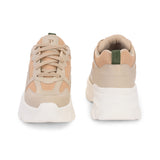 Beige chunky sneakers with a textured sole and mesh accents.