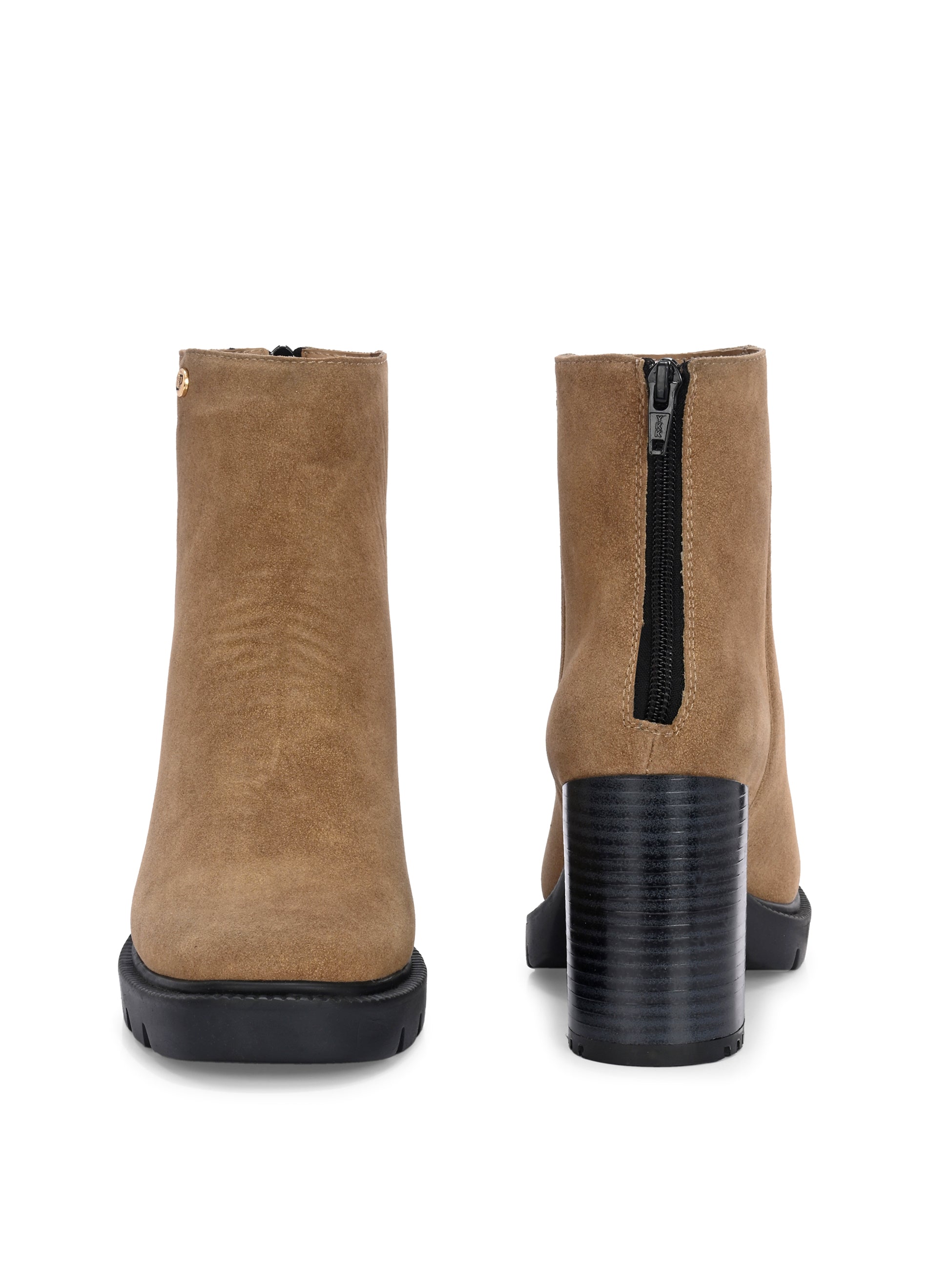 Glossy black patent leather ankle boot with a chunky block heel, lug sole, and a gold logo detail near the collar.