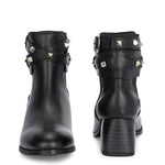 Black leather ankle boots with studded straps and a buckle design.