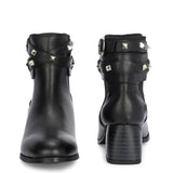 Black leather ankle boots with studded straps and a buckle design.