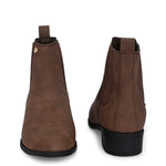 Brown suede slip-on boots with ribbed elastic panels, a pull-tab, and a low block heel for a stylish, comfortable fit.