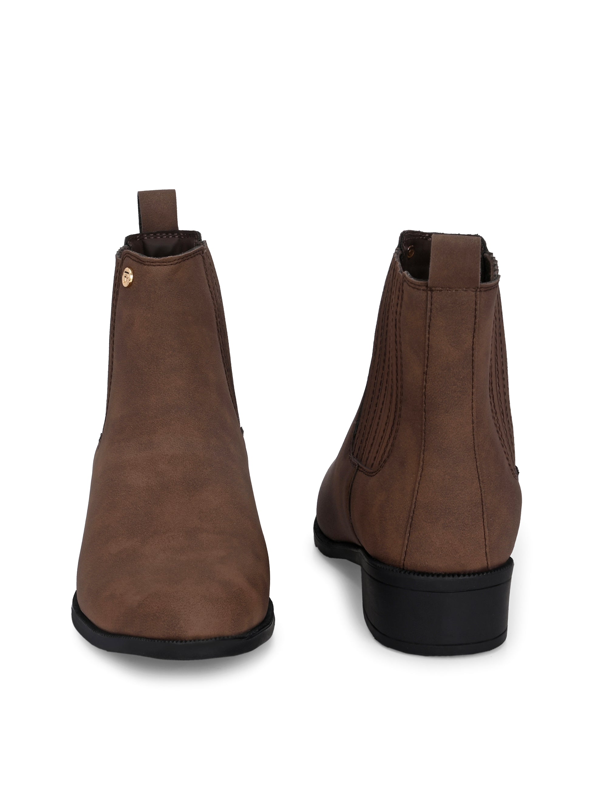 Brown suede slip-on boots with ribbed elastic panels, a pull-tab, and a low block heel for a stylish, comfortable fit.