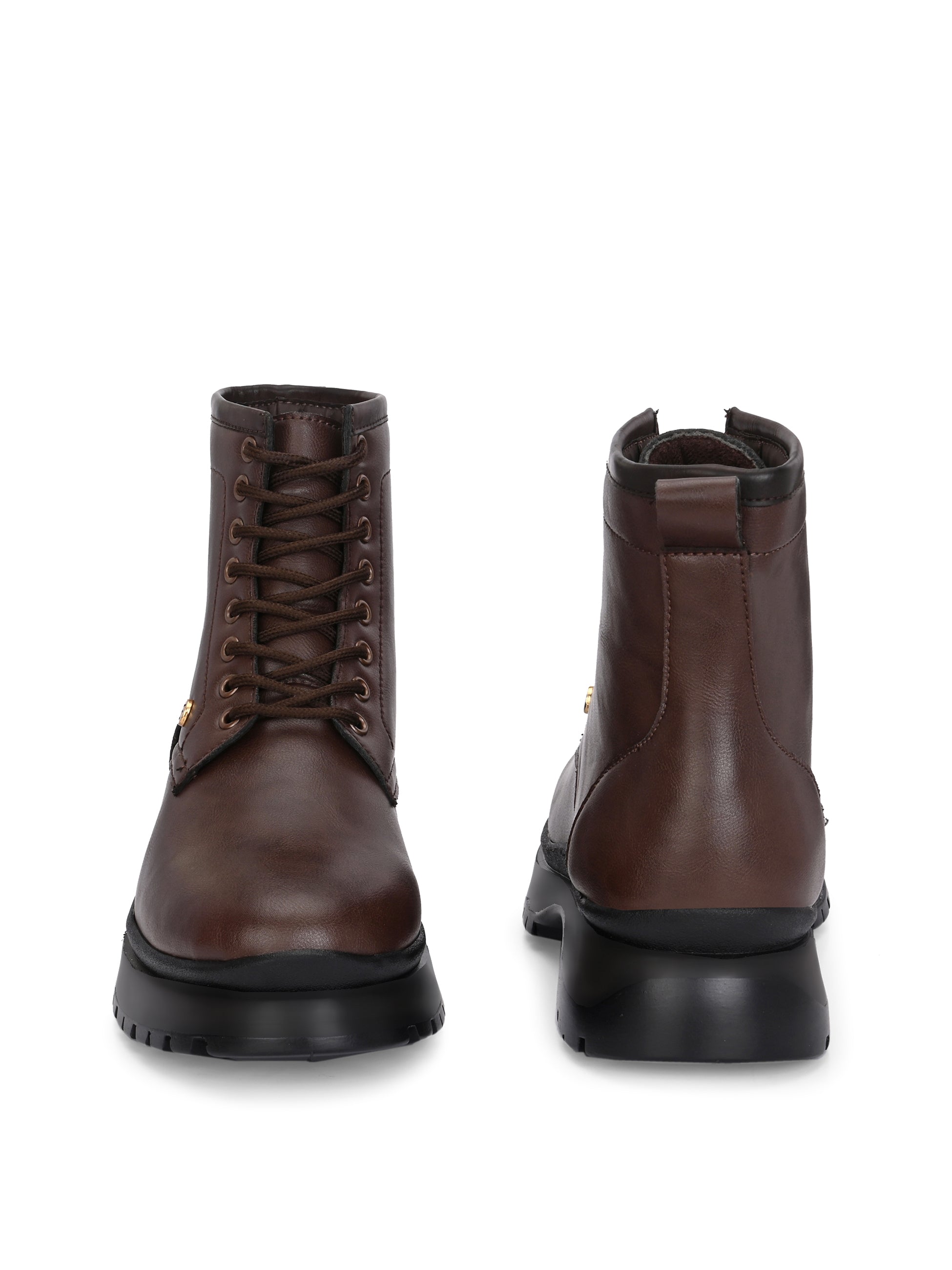 A sleek brown leather Chelsea lace-up boot with a side zipper, pull-tab at the back, and a low block heel.