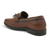 A brown El Paso loafer featuring stylish tassels on the side, showcasing a classic and elegant design.