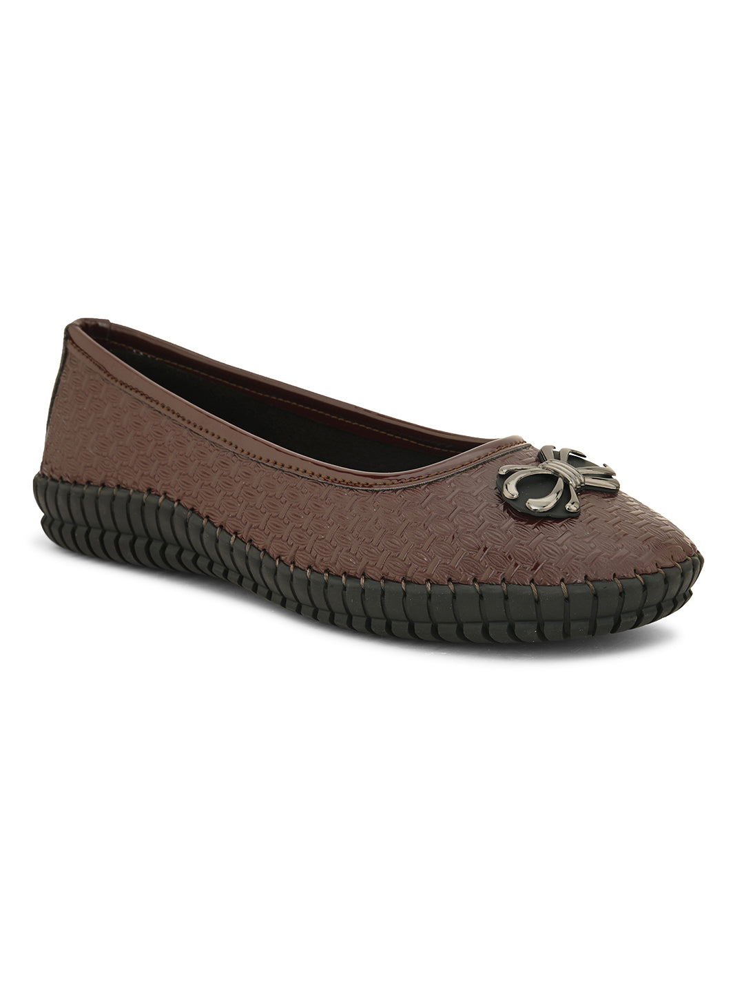 A brown woven-texture flat shoe with a round metal ornament on the toe and a black rubber sole.
