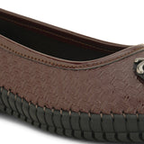 A brown woven-texture flat shoe with a round metal ornament on the toe and a black rubber sole.
