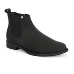 Black Chelsea boots with a matte finish, elastic side panels, pull-tab, and a subtle metallic logo accent.