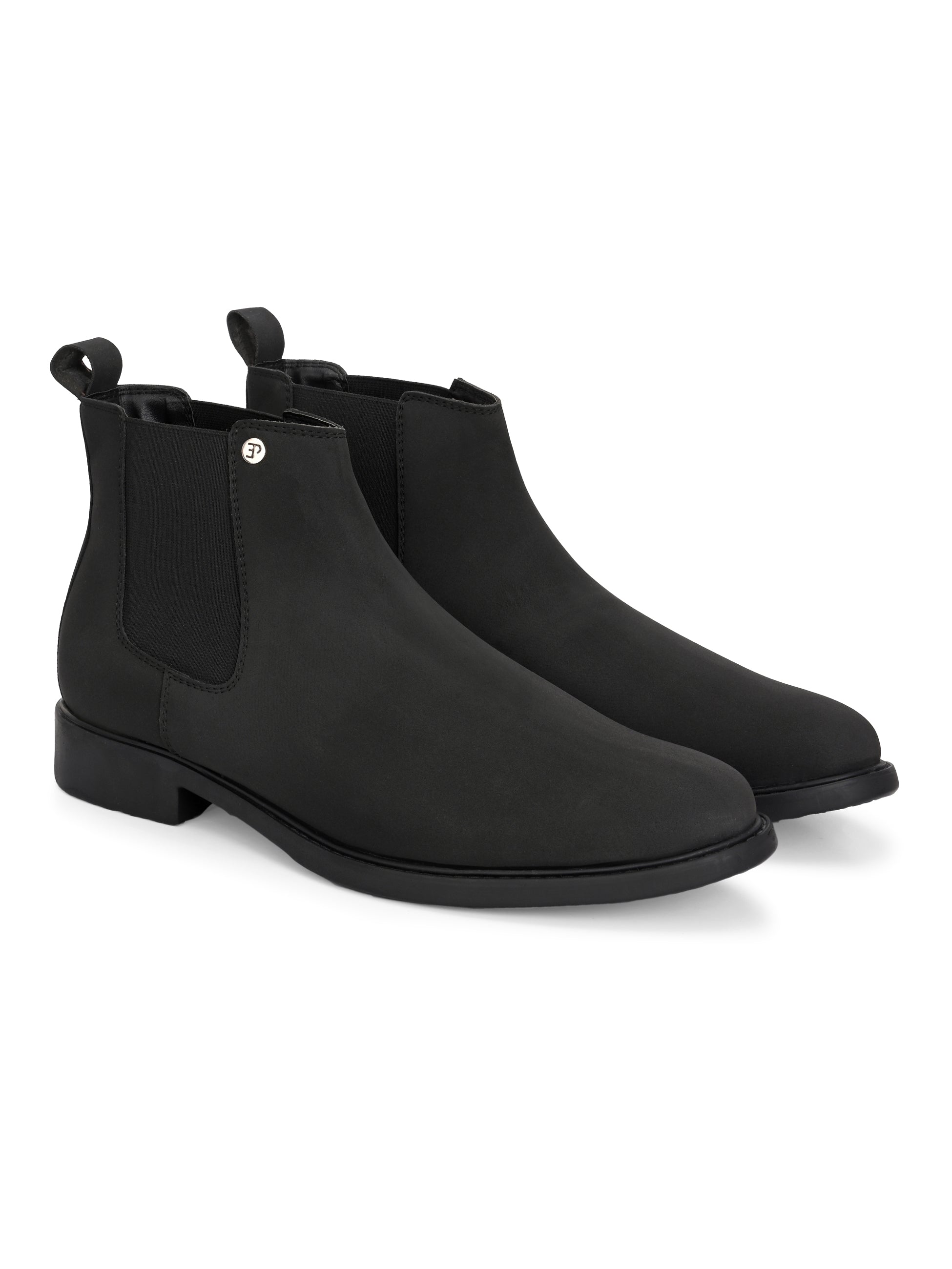 Black Chelsea boots with a matte finish, elastic side panels, pull-tab, and a subtle metallic logo accent.