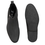 Black formal boots with a matte finish, elastic side panels, pull-tab, and a subtle metallic logo accent.