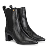 A sleek black crocodile-textured ankle boot with a pointed toe and mid-block heel, featuring an elastic side panel and a gold accent logo.