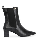 A stylish black ankle boot with a smooth leather finish, almond-shaped toe, mid-block heel, elastic side panel, and a gold accent logo.