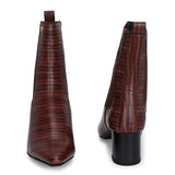 A stylish Tan ankle boot with a smooth leather finish, almond-shaped toe, mid-block heel, elastic side panel, and a gold accent logo.