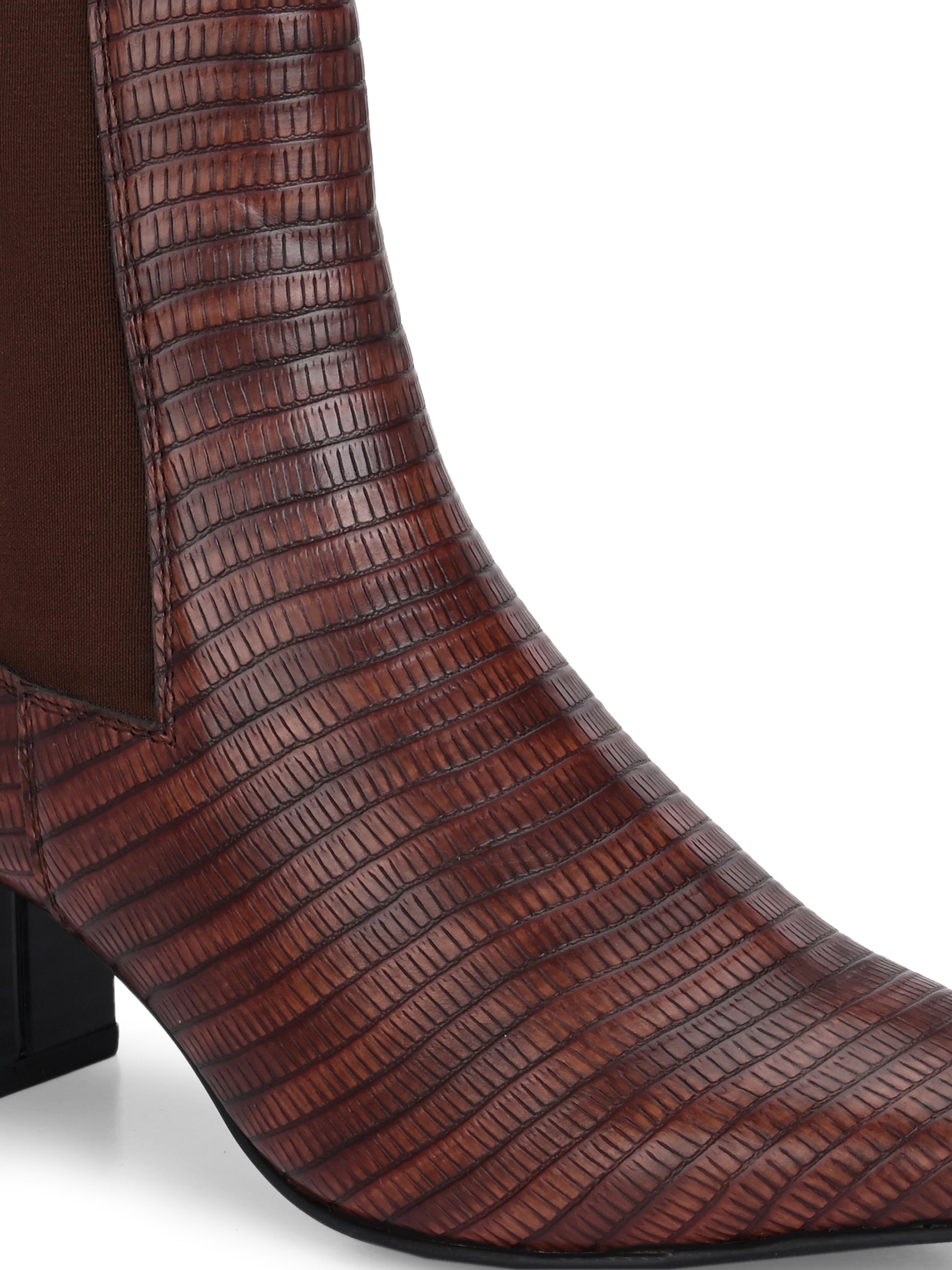 A stylish Tan ankle boot with a smooth leather finish, almond-shaped toe, mid-block heel, elastic side panel, and a gold accent logo.