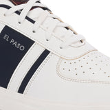 White lace-up sneakers featuring a navy blue stripe detail on the sides, perforated detailing on the toe, and a lightweight rubber sole.