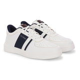 Men's Leather Casual Lace-Up Sneaker in white with navy blue stripe, perforated toe detail, and lightweight rubber sole.