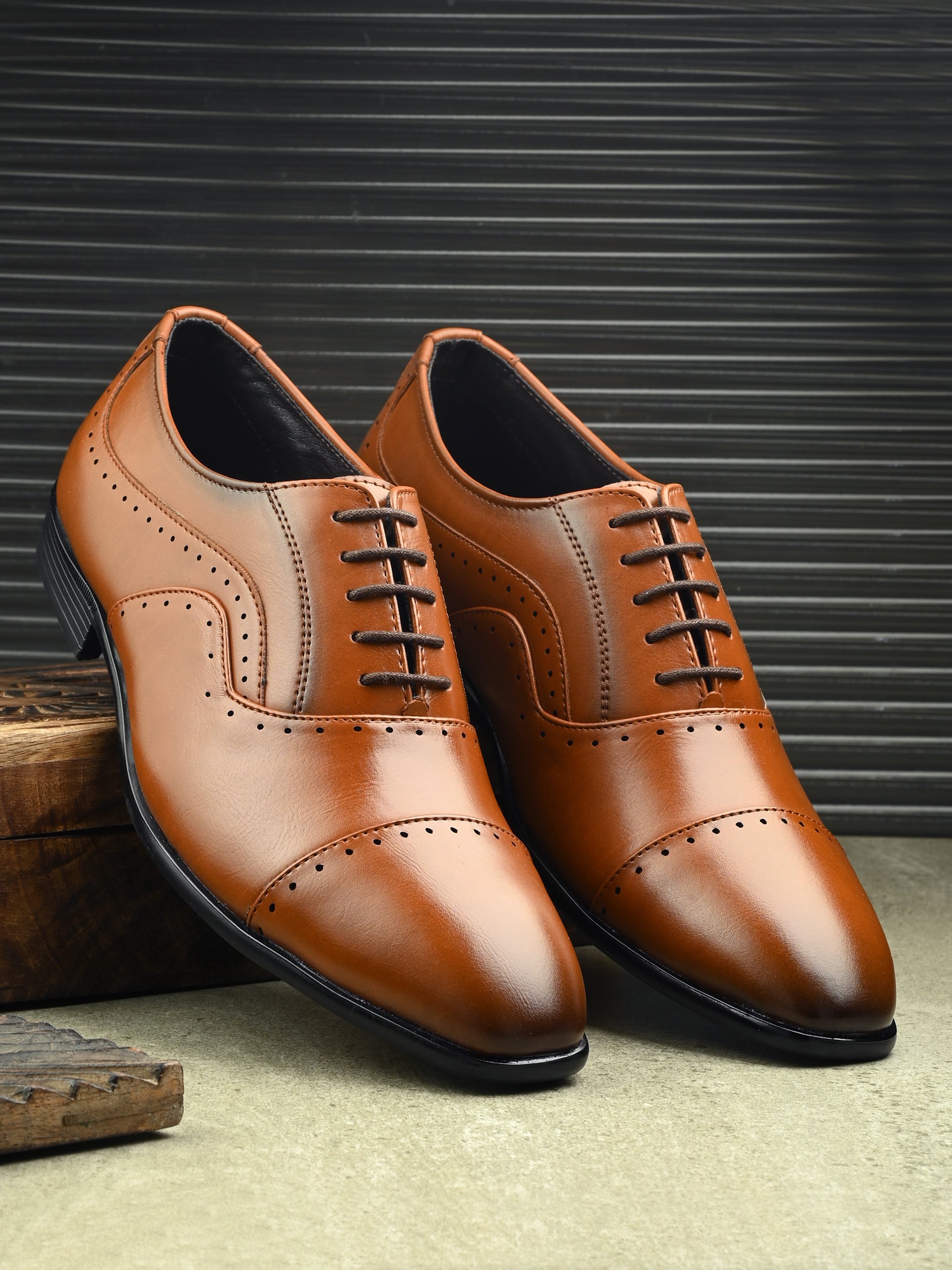 Men's leather formal shoes online, brown lace-up design with perforated toe cap and sides, low black heel.