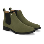 Olive Chelsea boots with a matte finish, elastic side panels, pull-tab, and a subtle metallic logo accent.