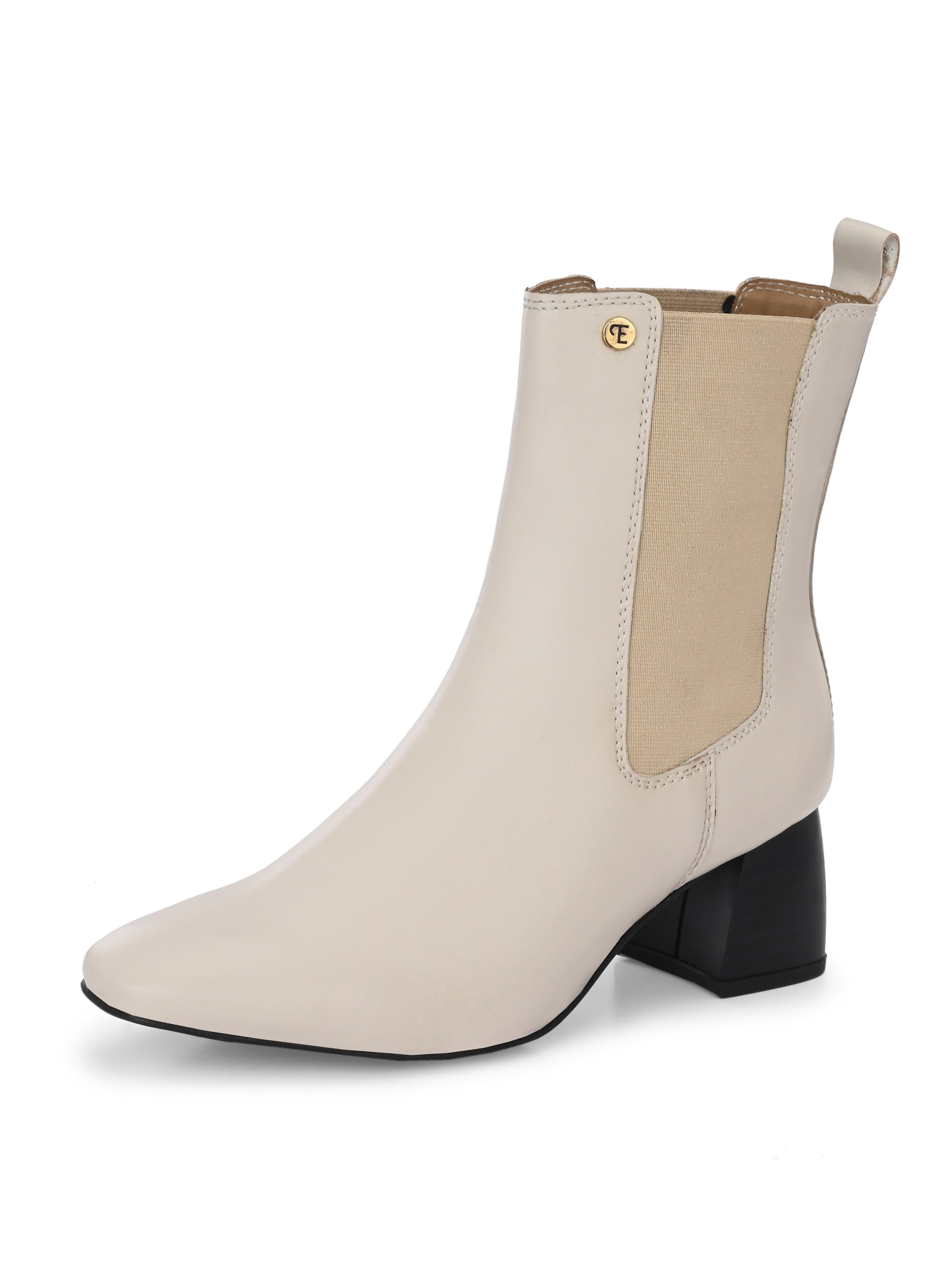 beige ankle boot with a smooth leather finish, elastic side panels, pull-tab, block heel, and pointed toe.