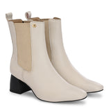 Women's black block heel ankle boots with smooth leather finish, elastic side panels, pull-tab, and pointed toe.