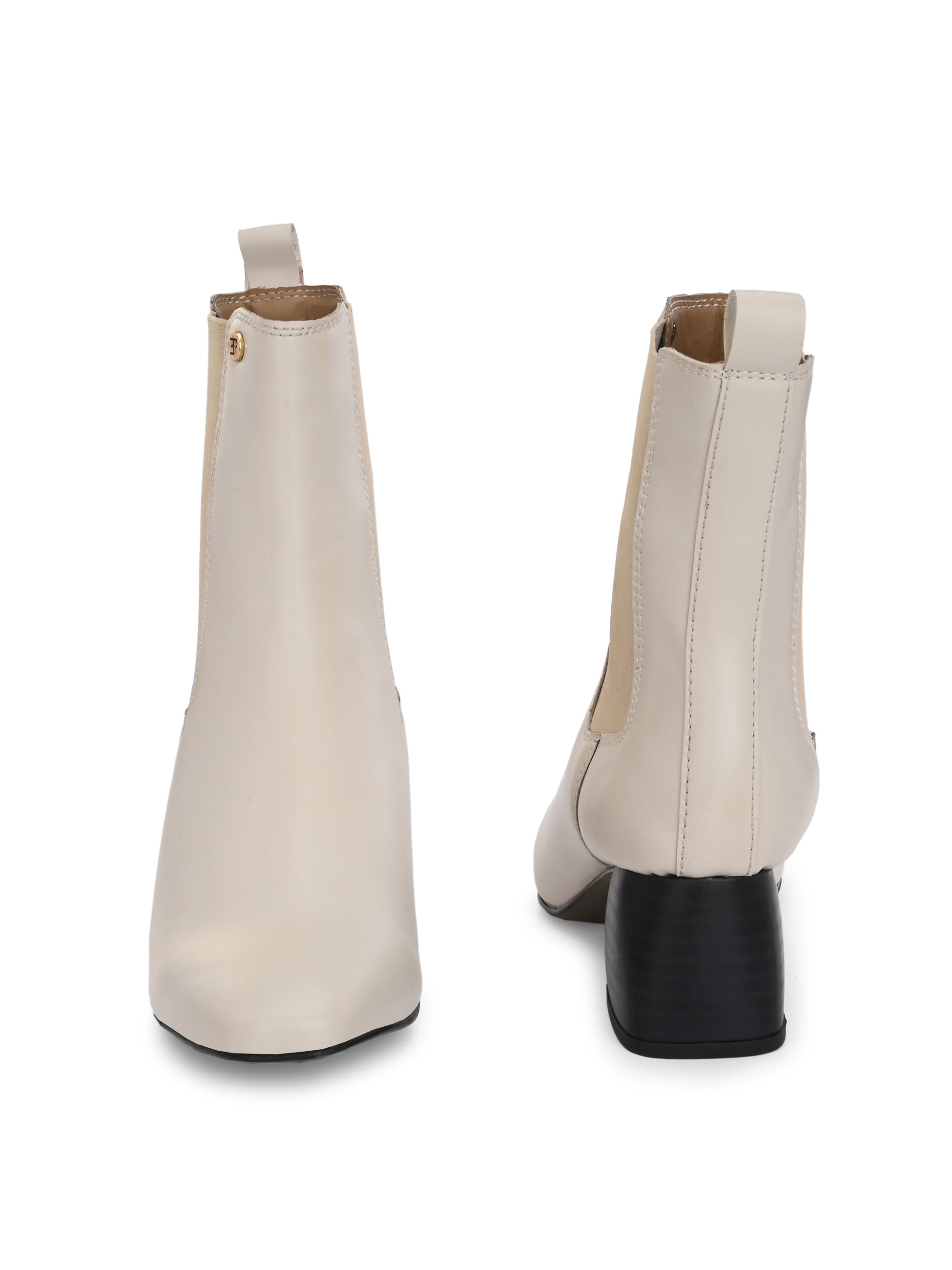 beige ankle boot with a smooth leather finish, elastic side panels, pull-tab, block heel, and pointed toe.