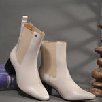 Women's black block heel ankle boots with smooth leather finish, elastic side panels, pull-tab, and pointed toe.